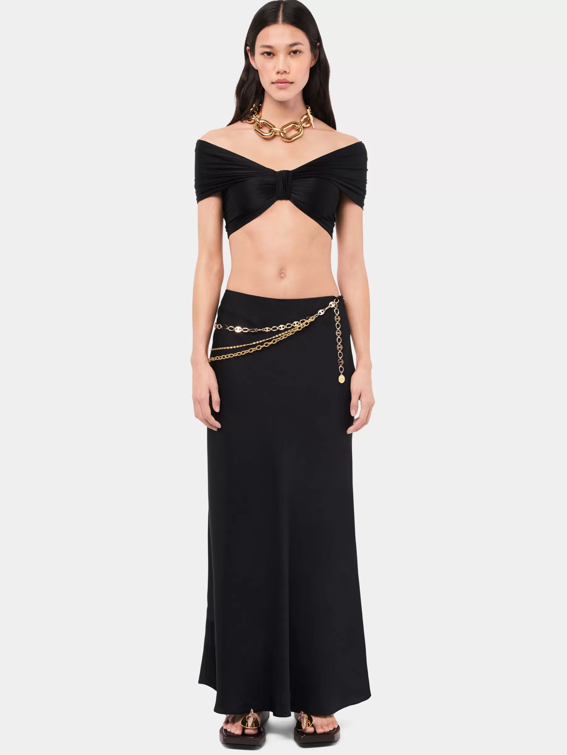 Rabanne Long black skirt embellished with "eight" signature chain